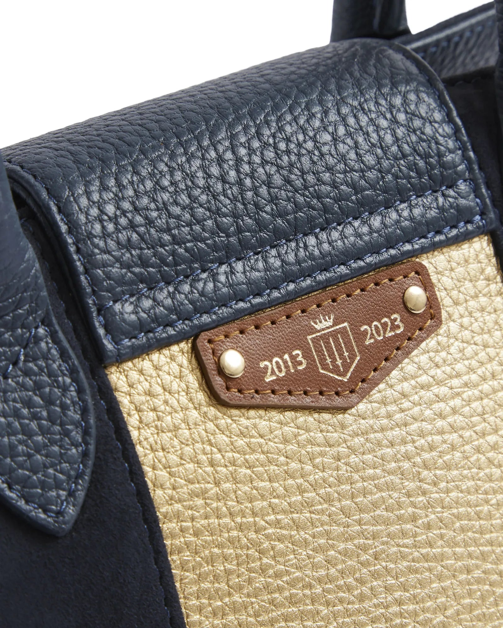 The Mini Windsor Handbag in Navy & Gold Suede
